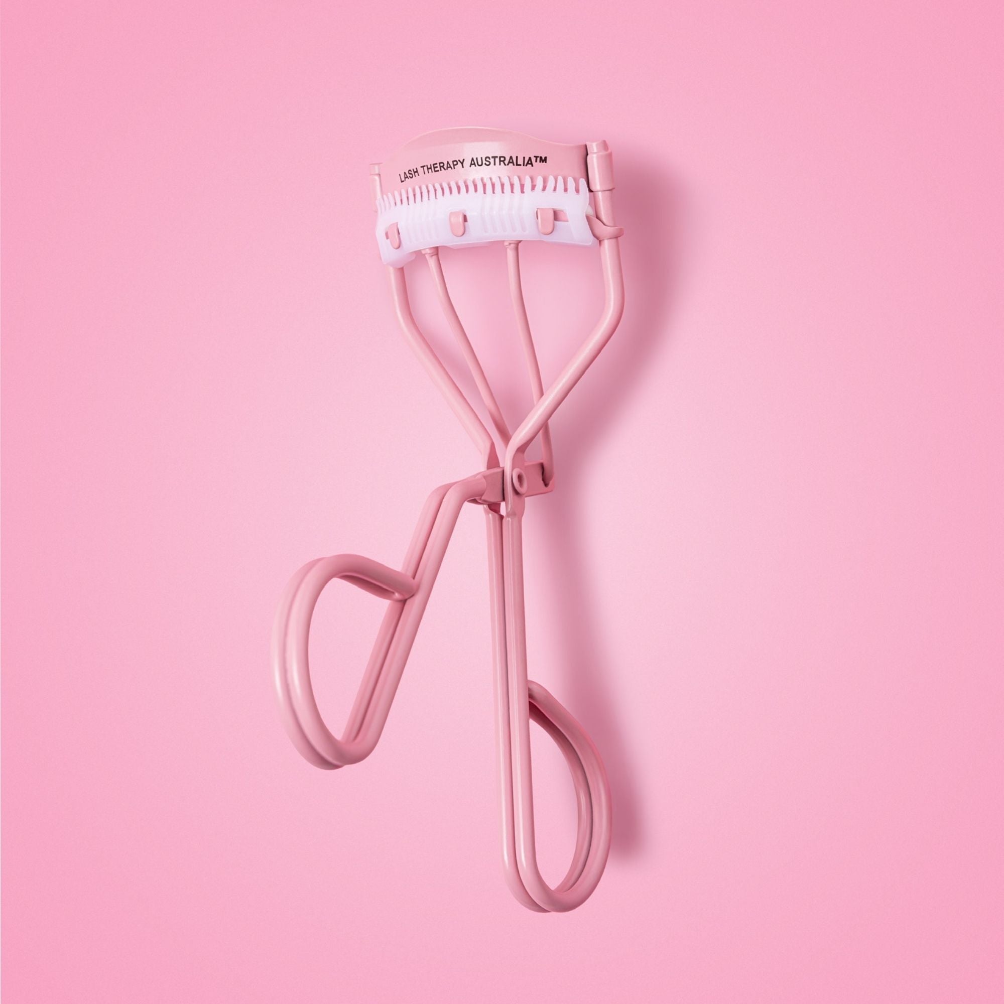 Lash Therapy Australia pink eyelash curler for lifting and curling lashes